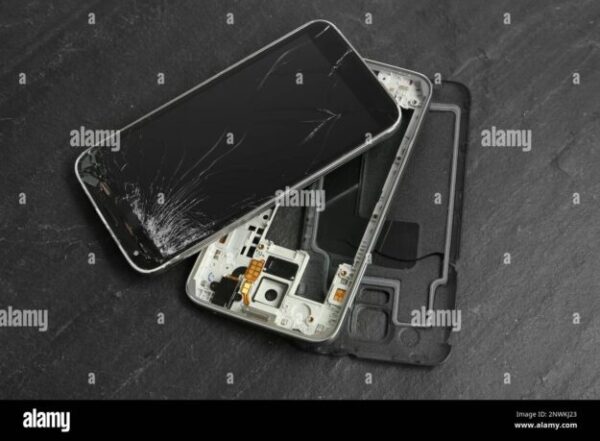 cropped-parts-of-broken-smartphone-on-black-table-above-view-device-repair-2NWKJ23.jpg Broken Phone Screen